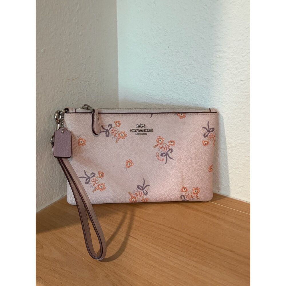 COACH Light Pink Floral Bow Print Corner Zip Wristlet EUC